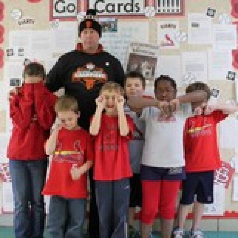 Crestwood Elementary students show their dismay at the Cardinals NCLS loss and their principal Scott Taylor sports San Francisco Giants gear as the result of a losing bet with a school in California. 