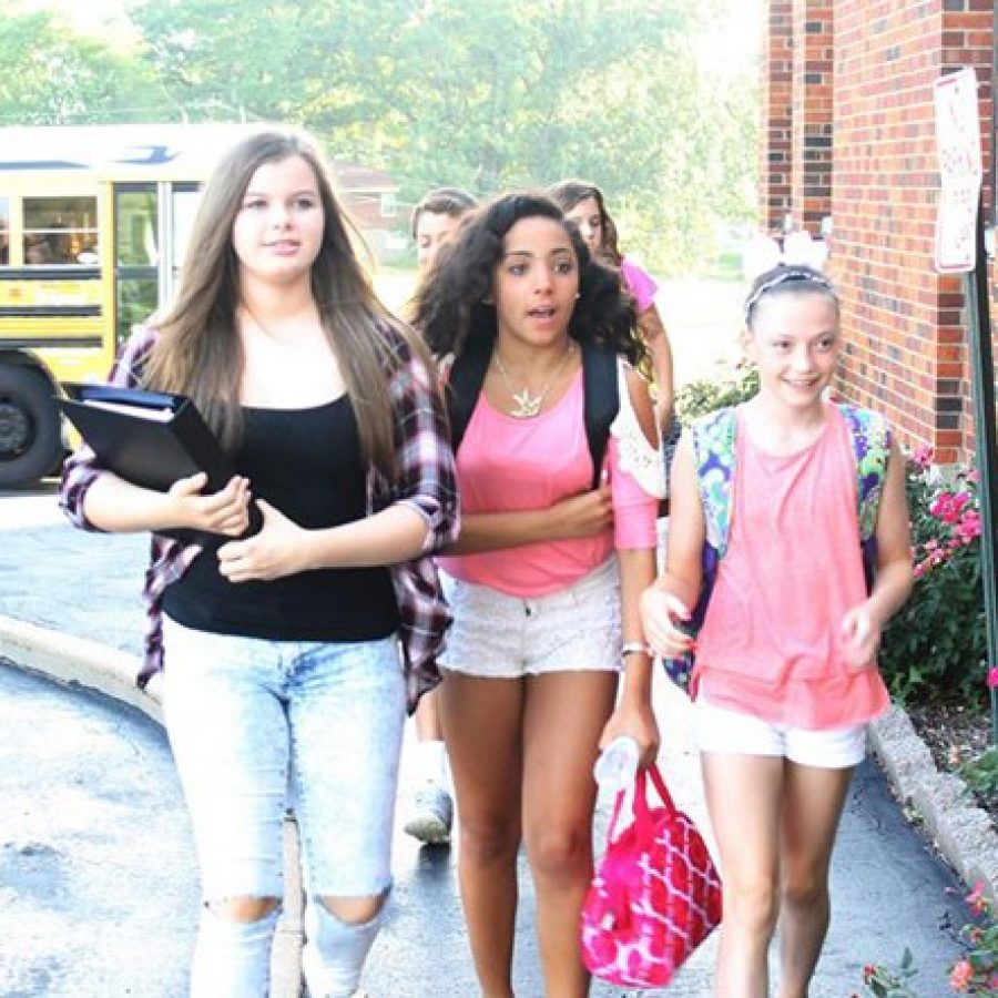 Students arrive at Oakville Middle School on the first day of school last year.