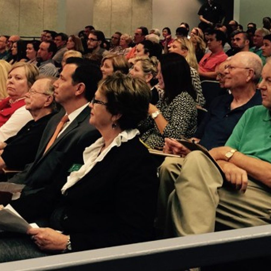 Neighbors of a proposed south county apartment complex listen Tuesday night as council members explain that legislation for the apartments is being sent back to the county Planning Commission.