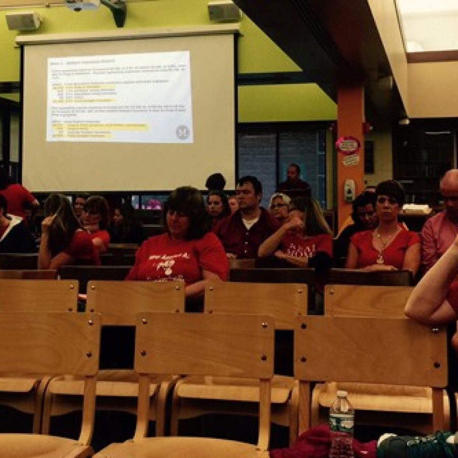 Mehlville teachers attend the May 12 Board of Education meeting wearing red.