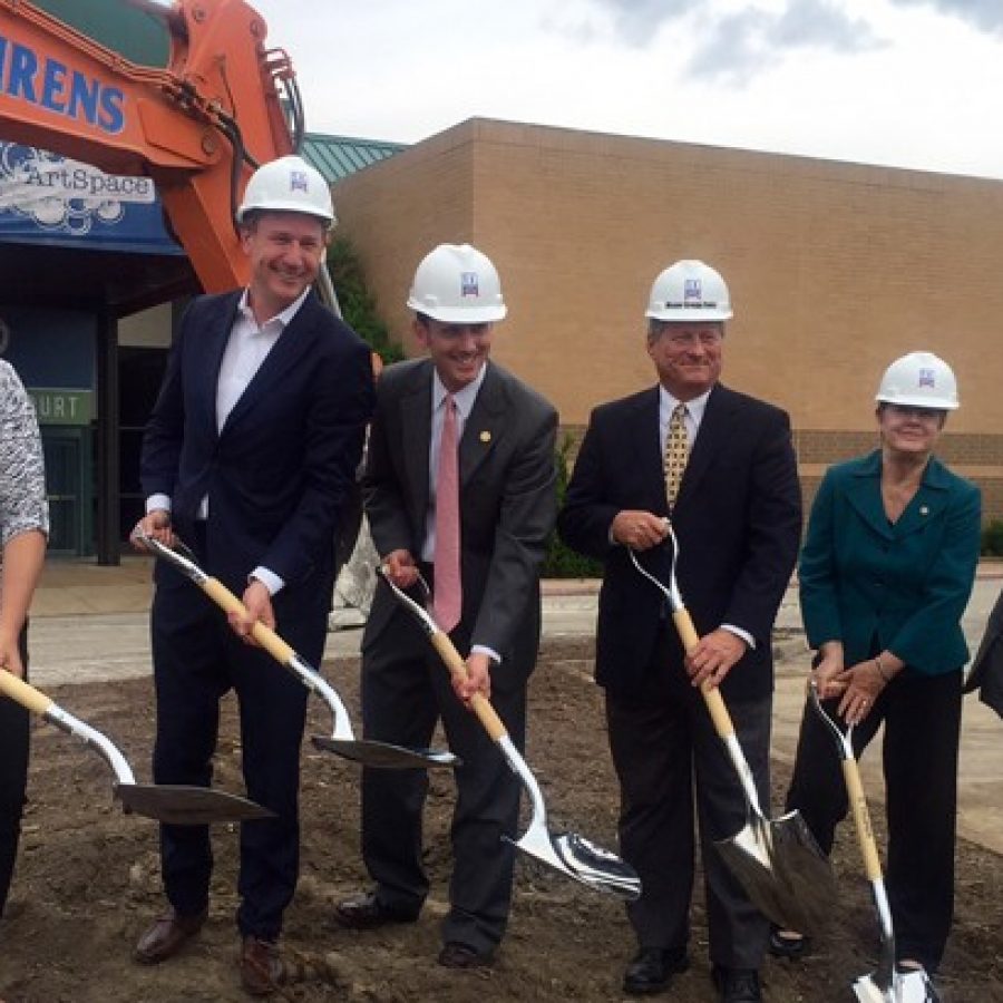 Breaking ground for the \$104 million Crestwood Plaza redevelopment Tuesday. from left, are: Pamela Wucher of UrbanStreet, UrbanStreet managing partner Bob Burk, Sen. Scott Sifton, D-Crestwood, Mayor Gregg Roby, Rep. Jeanne Kirkton, D-Webster Groves, and City Administrator Kris Simpson.