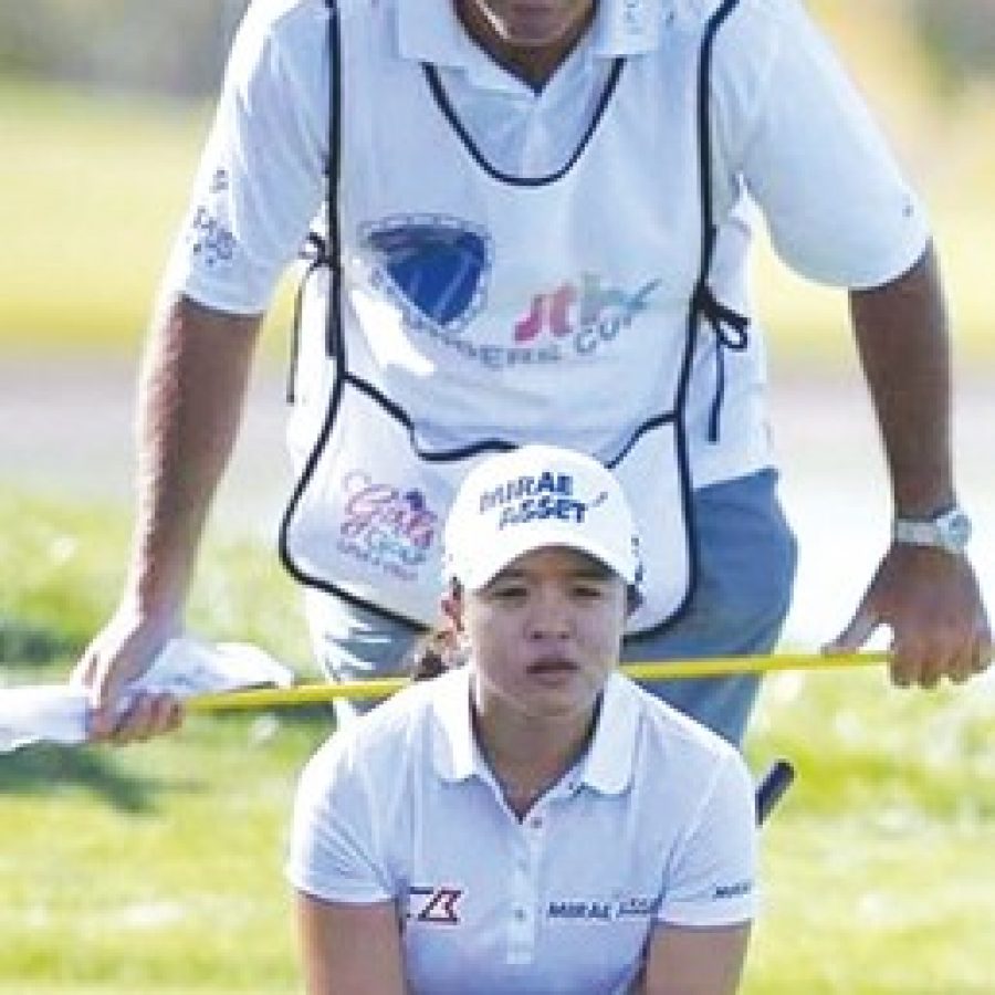 South county native Paul Fusco is caddying in the Olympics this week for the sixth-ranked golfer in the world, Sei Young Kim.