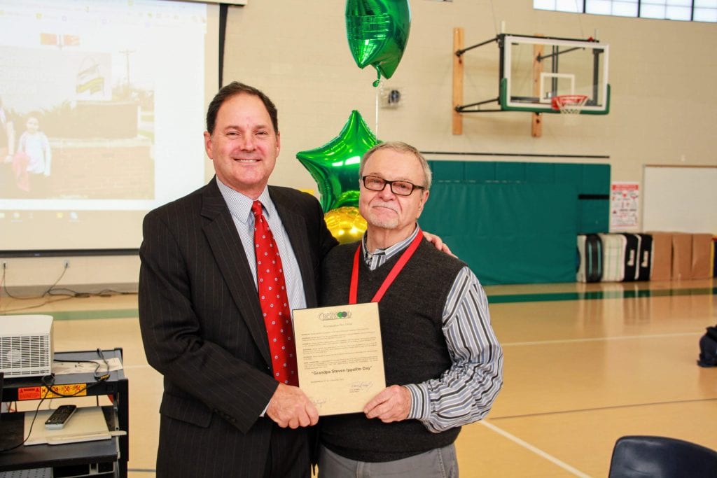 Crestwood acting Mayor Tony Kennedy presents Concord Elementary School volunteer Steve Ippolito with a proclamation declaring Nov. 20 ‘Grandpa Steven Ippolito Day,’ in honor of the Crestwood resident’s service to the community