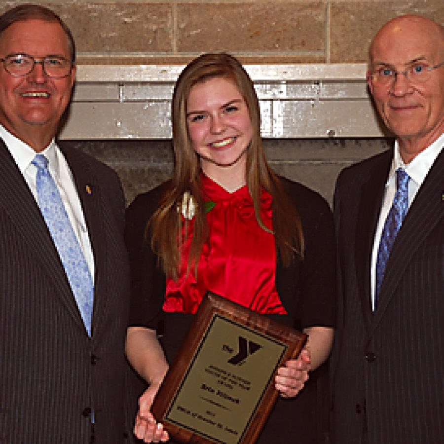 Lindbergh High School student Erin Vilimek displays her YMCA Youth of the Year Award at last weeks YMCA of Greater St. Louis annual Youth of the Year Awards Dinner. Pictured with Vilimek are Gary Schlansker, left, president and chief executive officer of the YMCA of Greater St. Louis, and Rick Boyle, vice president of human resources and dean of faculty at Lindenwood University.