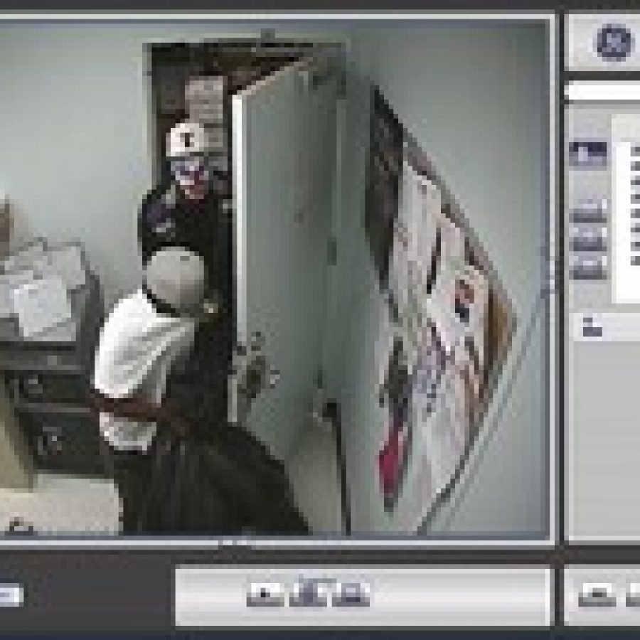 Police seek help in identifying T-Mobile store robbers