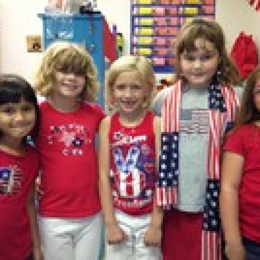 First-grade students at Sappington Elementary School celebrated Patriot Day by learning about the founding of the United States, and reading a childrens book about Sept. 11, 2001. 