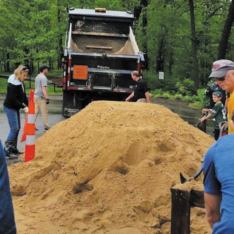 The city of Sunset Hills provided sandbags to residents impacted by last weeks flooding. Volunteers responded in force to the citys call to fill the sandbags at Watson Trail Park, above.