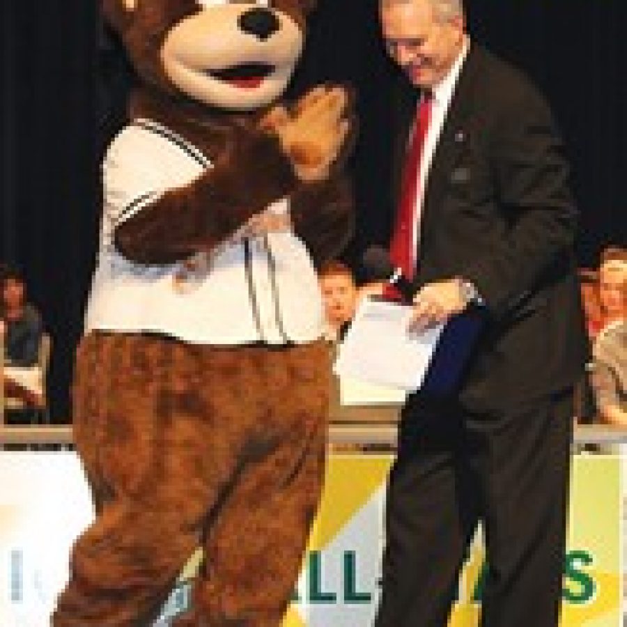 Lindbergh Schools honored 1,600 students in grades four through eight for their outstanding academic achievement at three Academic All-Stars evenings. The event is made possible by several community business sponsors. Above, Superintendent Jim Simpson jokes around with Izzy the Grizzlie, mascot for the Gateway Grizzlies, on Nov. 25.  