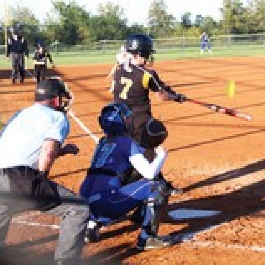 Oakvilles Adrianna Wegmann hits this sacrifice fly to score the go-head run against Hillsboro last week. The Tigers defeated Hillsboro 5-4 in the Oct. 16 game.
Megan LeFaivre-Zimmerman photo
 