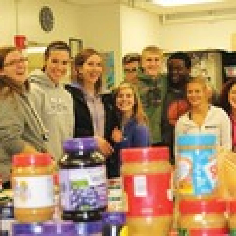 Mehlville Senior High School students in Jane Perricas leadership class unpack some of the food items collected during a recent community food drive for the schools student pantry. Pictured, from left, are: Alaina ONeill, Tara Becker, Alexa Dell, Emma Torno, Bailey Miller, Ian Hurt, Shane Burke, Marc Jones, Amber Rickert, Emily Ackels and Rachel Benesh. 