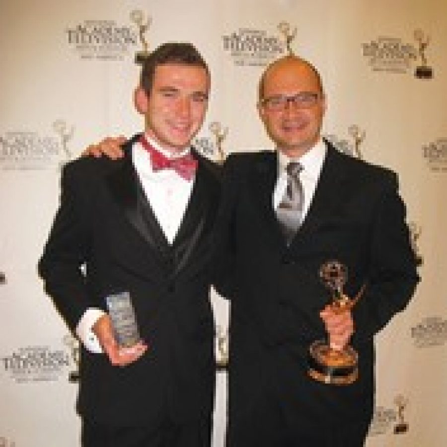 Ryan and Scott Huegerich are shown with the Emmy Awards they received at the 37th Mid-America Emmy gala. 