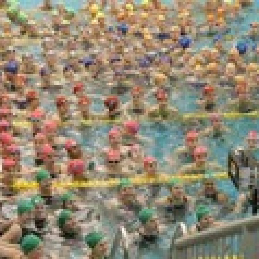 This rainbow of brightly colored swim caps did more than just distinguish rival high schools — their symbolic hues also showed support for various types of cancer research at the 10th annual Lady Flyer Invitational. 