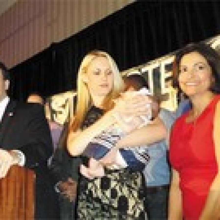 Sixth District County Councilman Steve Stenger, left, celebrates his victory in the Democratic primary for county executive Aug. 5 with his wife, Allison; their daughter Madeline Jane; and his legislative assistant, Linda Henry, right.