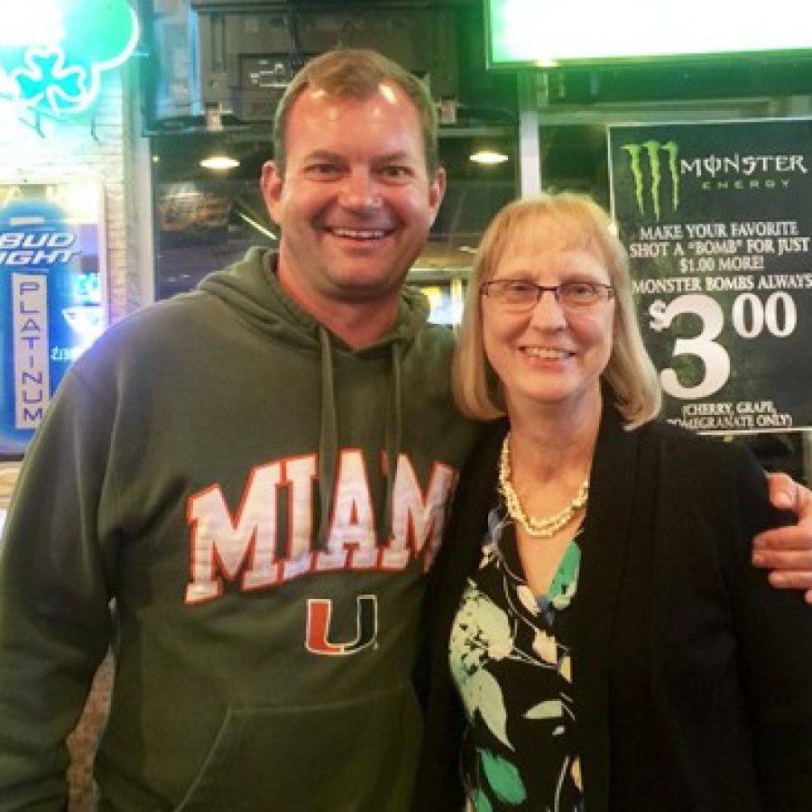 Mehlville Fire Protection District Board of Directors Chairman Aaron Hilmer and board Treasurer Bonnie Stegman celebrate his election to a third six-year term Tuesday night. Gloria Lloyd photo.