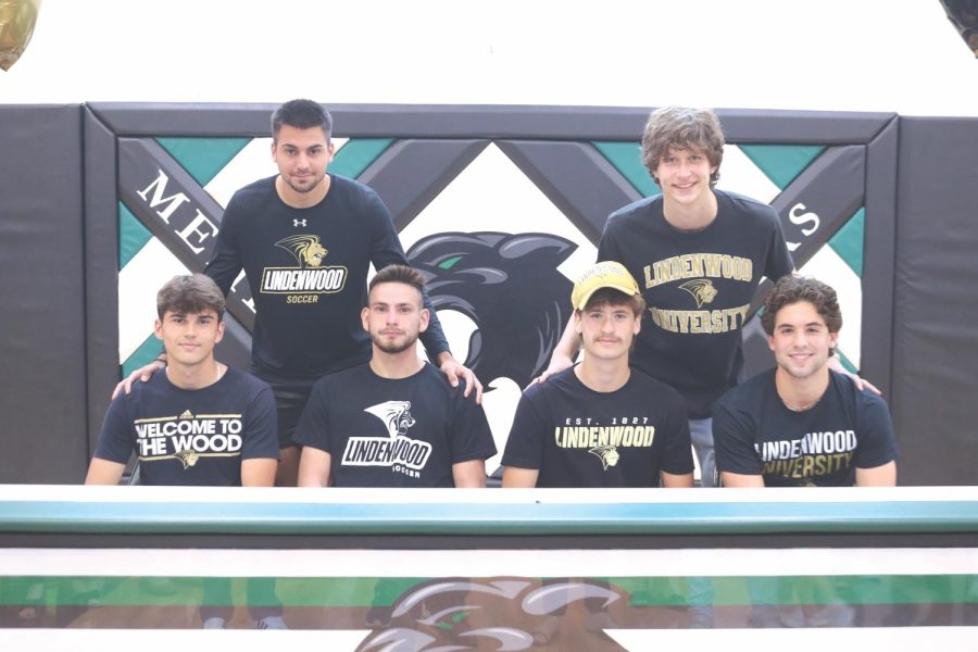 The+four+Mehlville+soccer+players+signing+at+Lindenwood.+