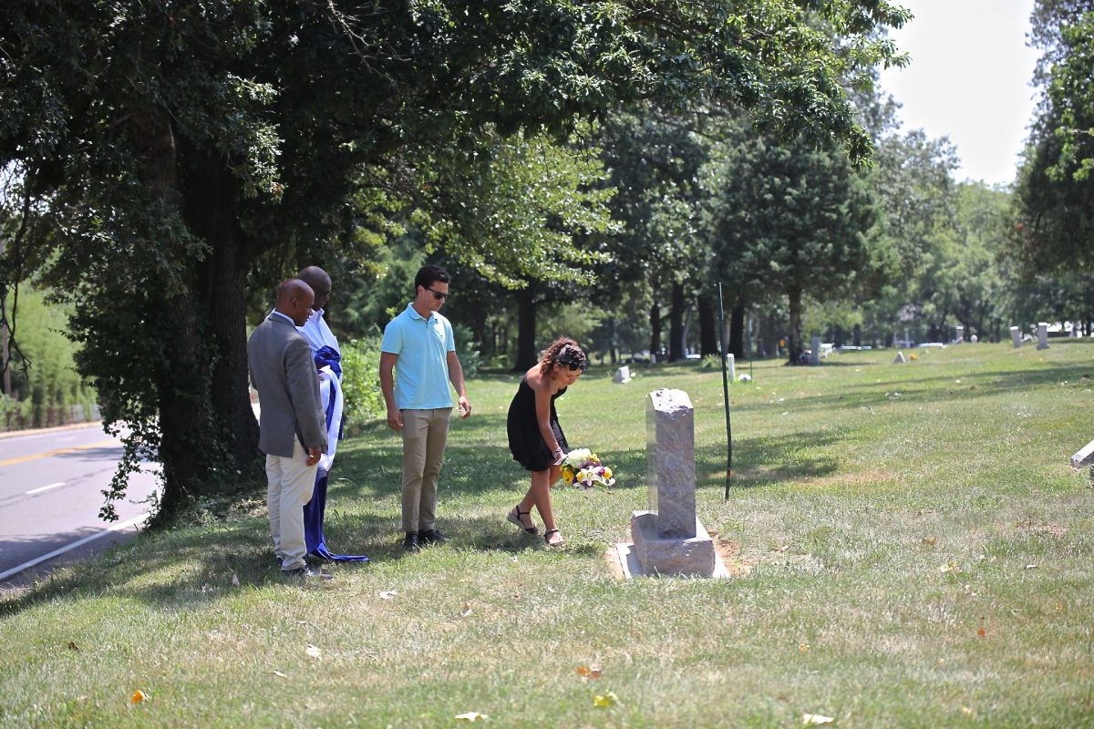 Paul Thornell, great-great grandson of George Boyer Vashon and Susan Vashon; his children, Nolan and Lena Thornell; and Calvin Riley, director of the George B. Vashon History Museum, unveiled the new Vashon family monument at Father Dickson Cemetery in Crestwood July 29, pictured above.