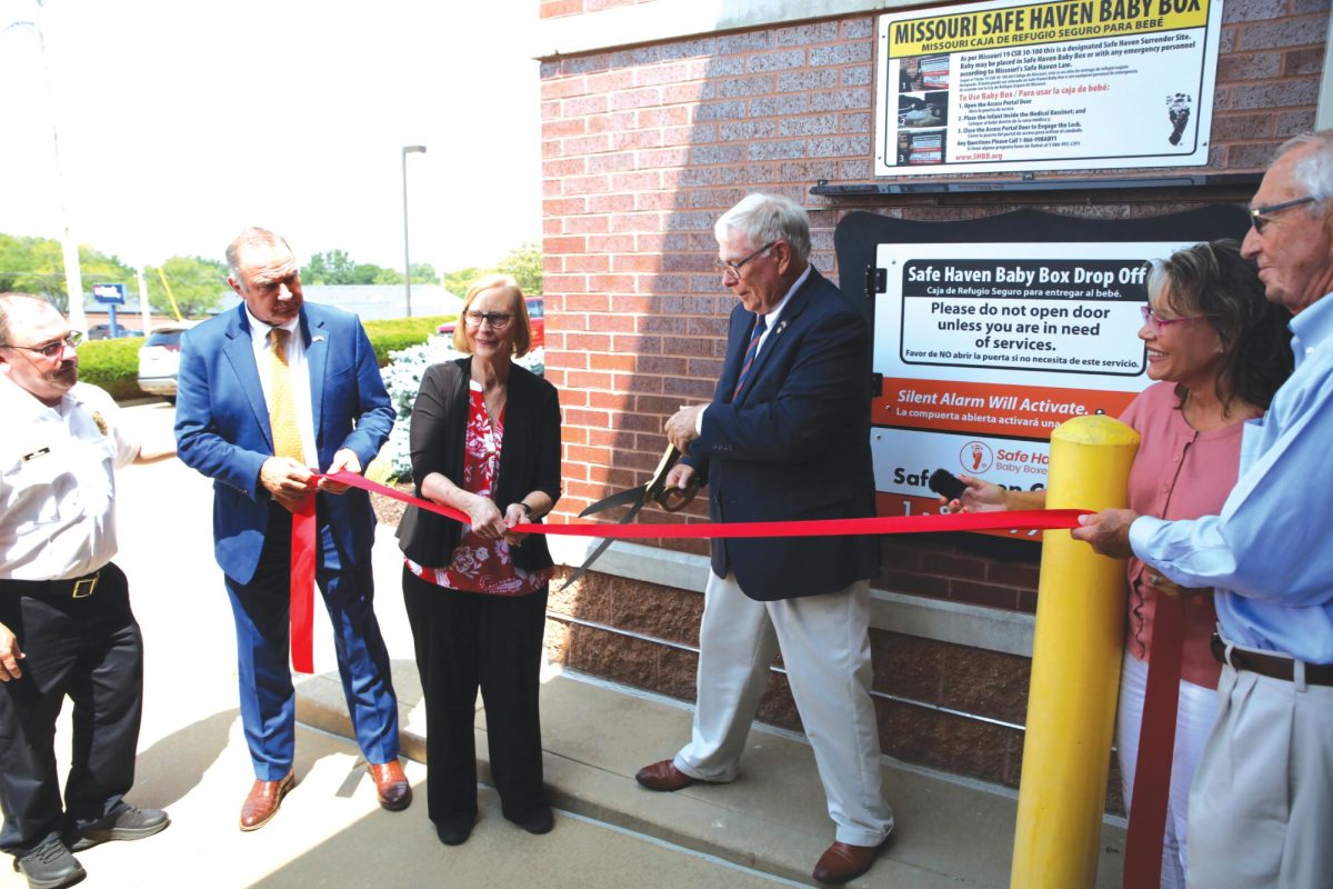 Missouri’s first Safe Haven Baby Box was installed in South County at the Mehlville Fire Protection District’s Engine House No. 2, 5434 Telegraph Road. The box was dedicated at a ribbon cutting event Aug. 8, pictured above, which was attended by Rep. Jim Murphy of Oakville (pictured center) – who sponsored the legislation for the baby boxes, Mehlville Fire Chief Brian Hendricks and Lt. Gov. Mike Kehoe. The boxes are designed to let parents anonymously and safely surrender newborns at firehouses, hospitals and other public safety locations.
