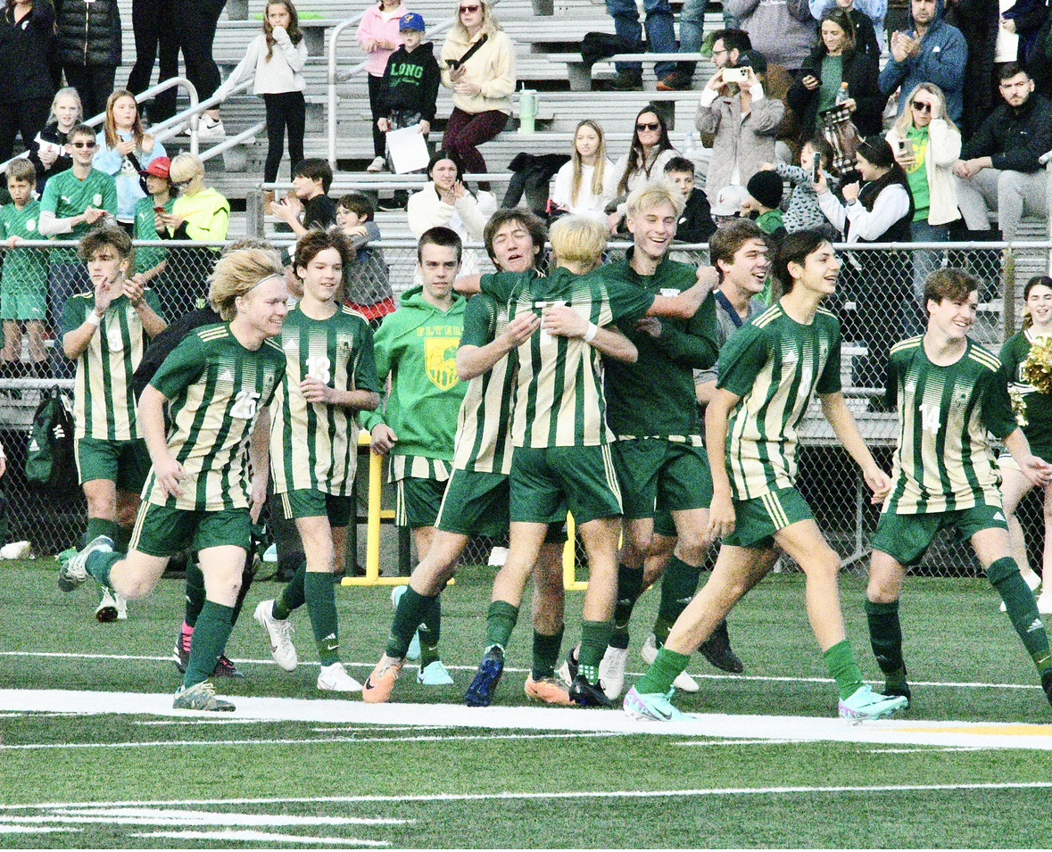 The Lindbergh boys soccer team celebrates after defeating CBC 3-0 on Nov. 11.