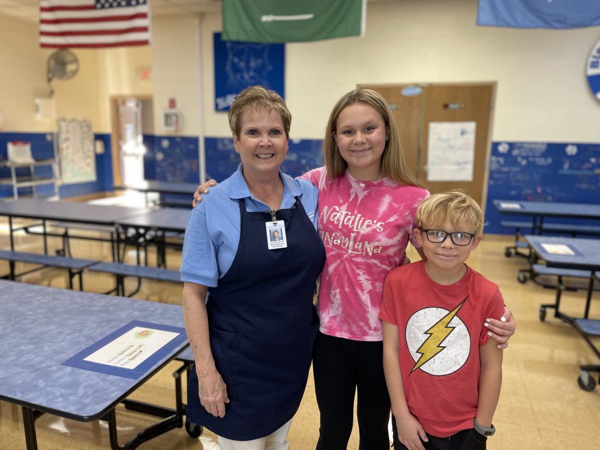 Natalie and Zachary Chapman with Blades Elementary Cafeteria manager Michelle Kovacich. 