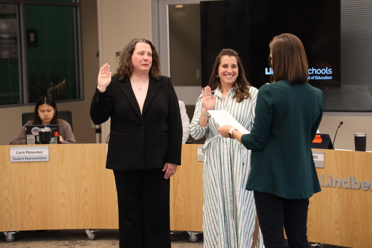 Lindbergh Schools swears in Rachel Braaf Koehler, left, and Megan Vedder, onto the Board of Education at a meeting April 9. Koehler and Vedder won election to the school board April 2. Photo courtesy of Lindbergh Schools.