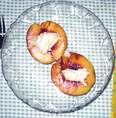 Grilled nectarines topped with honey and mascarpone cheese provides an elegant end to any meal.