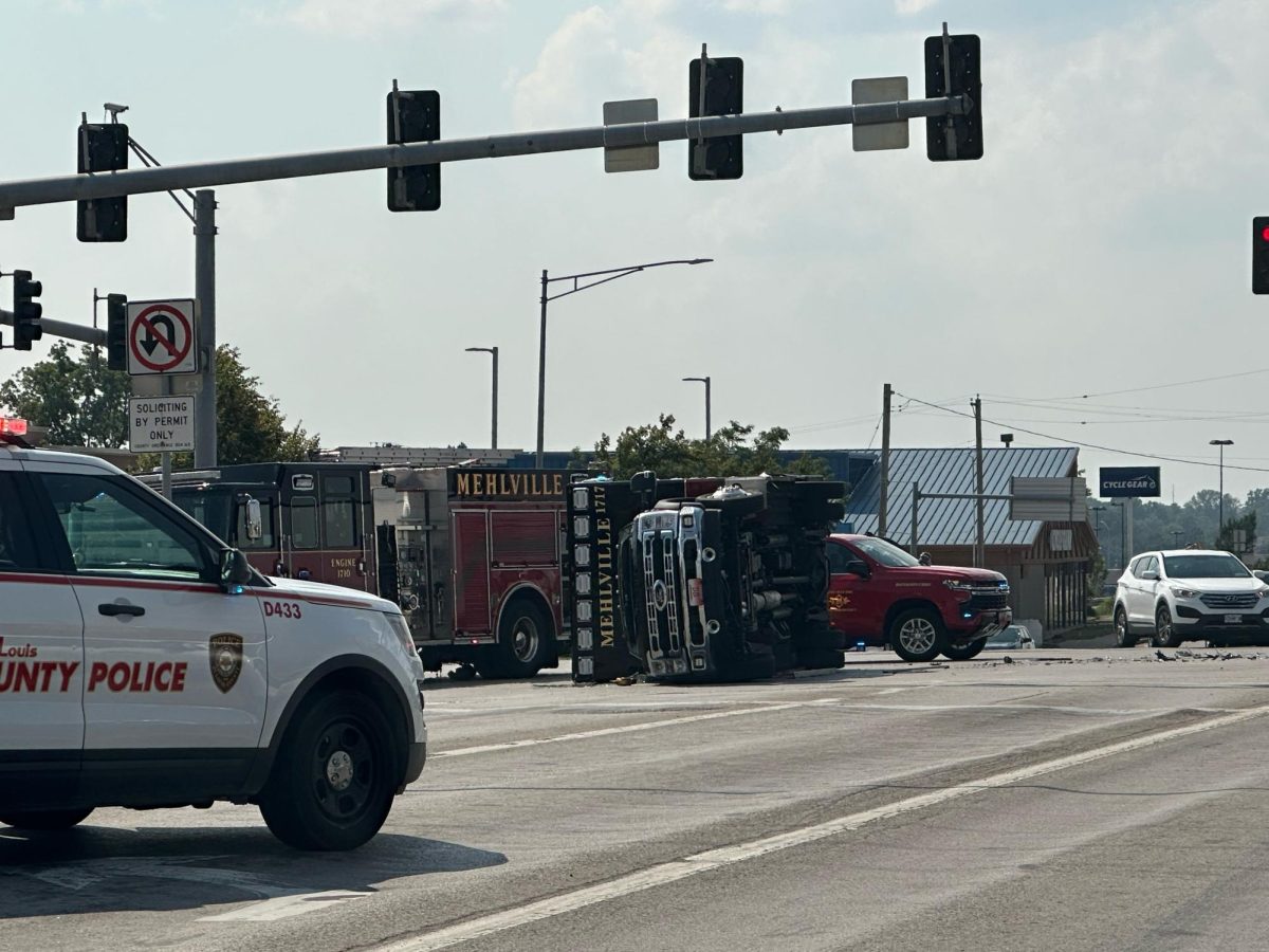 The flipped ambulance at the intersection of Lemay Ferry Road and Lindbergh Boulevard.