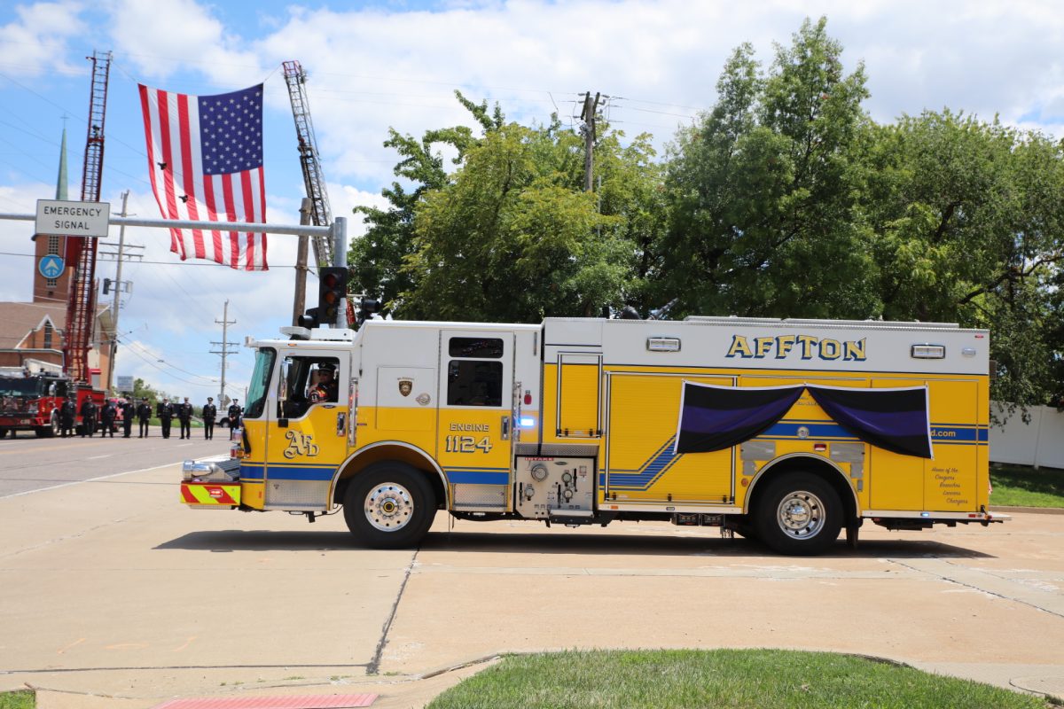Following the funeral of Affton Fire Capt. James Cova July 18, a procession of emergency vehicles and civilian cars traveled from Kutis Funeral Home up Gravois Road, eventually ending at St. Paul Churchyard. Pictured above, the route stopped at Affton Firehouse 1, 9282 Gravois Road, so Capt. Cova could be driven through one last time.