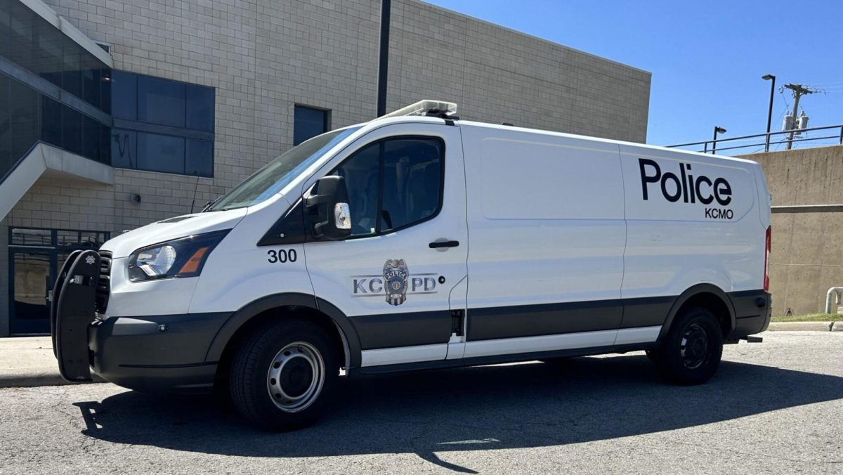 A Kansas City police van sits outside a patrol station on Linwood Boulevard. Photo by Allison Kite/Missouri Independent.