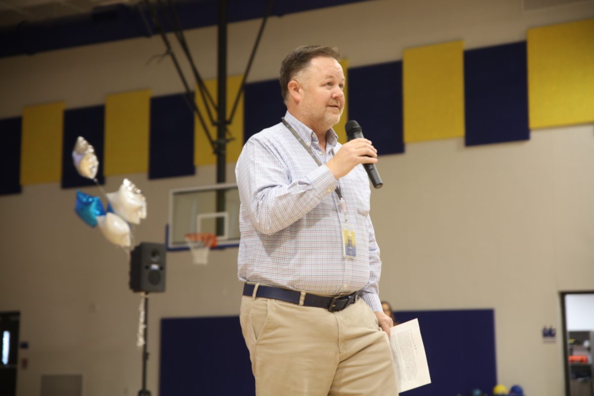 Timothy McInnis, assistant superintendent of Hancock Place School District, explains the "Learn-to-Ride Program."