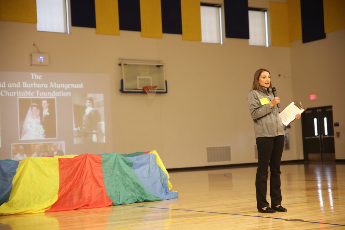 Jessica Mungenast of Dave Mungenast Family of Dealerships addresses the crowd.