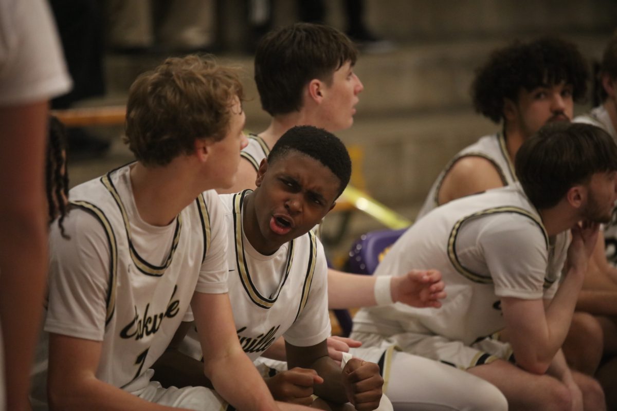 Oakville guard DJ McDonald hypes his teammates up on the Oakville bench.