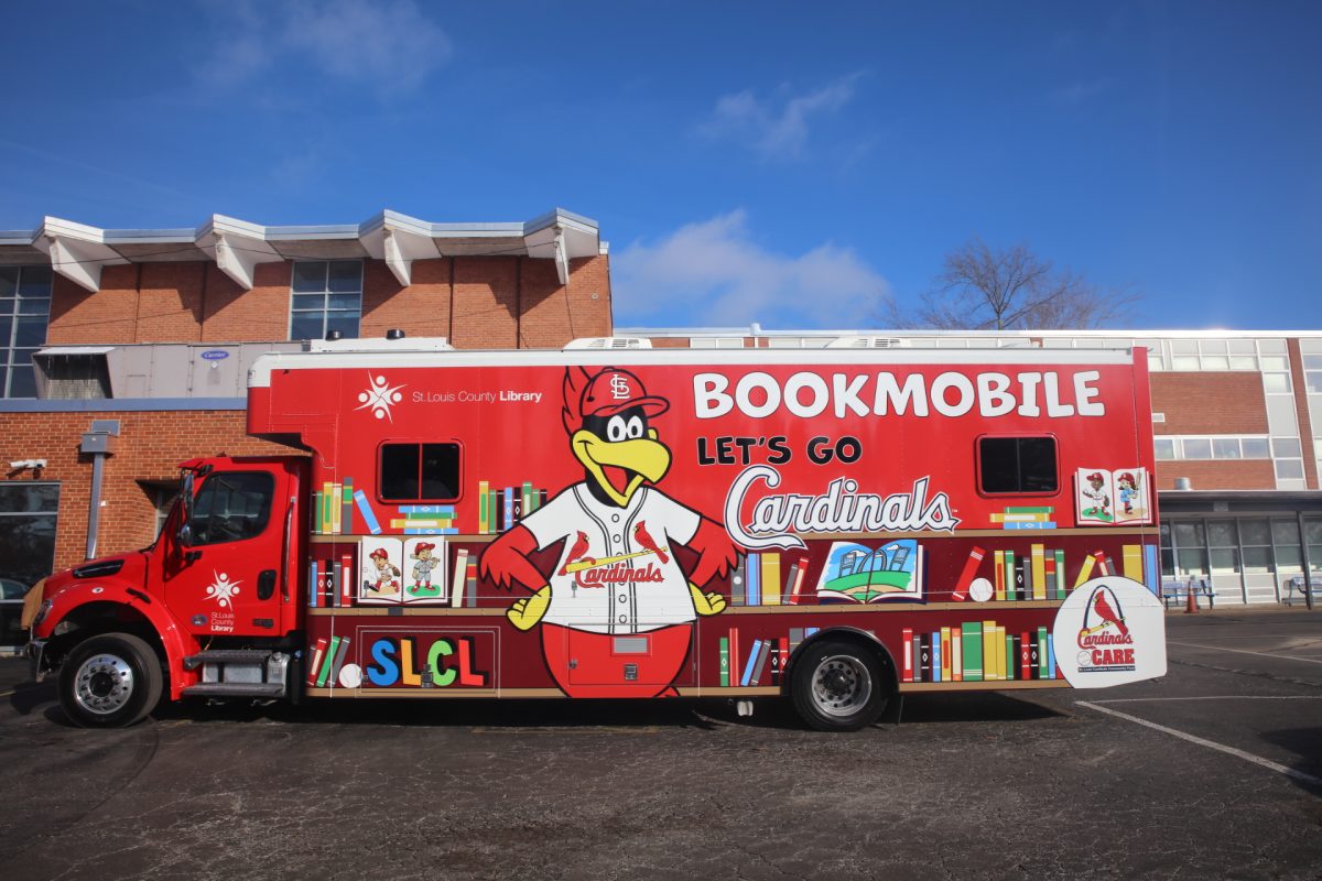 The new St. Louis County Library and Cardinals Care Cardinals-themed bookmobile.