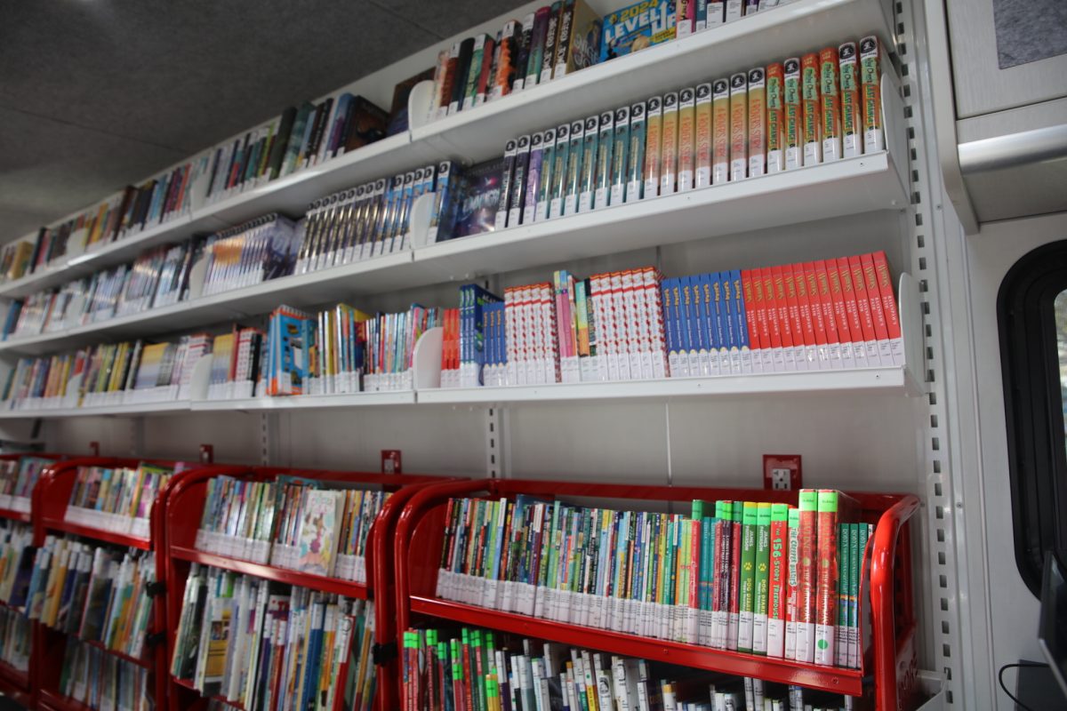 The new St. Louis County Library and Cardinals Care bookmobile holds over 5,000 books.