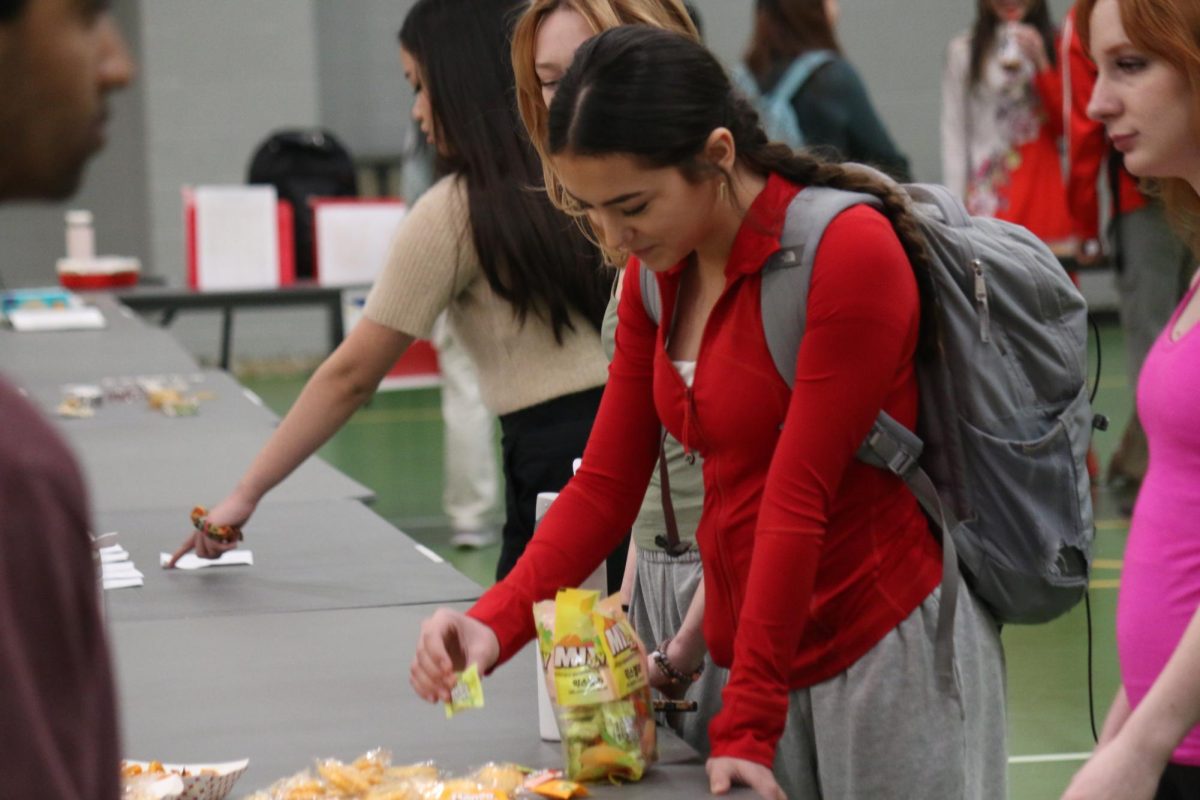 A Lindbergh student takes Korean candy to sample.