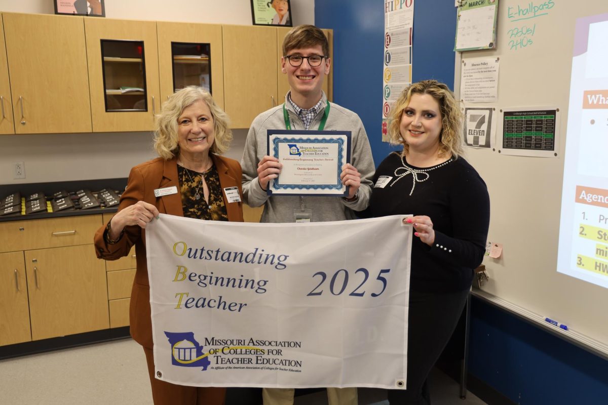 Charlie Yeldham was presented  Missouri’s Outstanding Beginning Teachers award from the Missouri Association of Colleges for Teacher Education by Michele Augustin, director of teacher education and academic services at Washington University, and Jessica Bockskopf, teaching supervisor at Washington University. Photo courtesy of Lindbergh Schools.