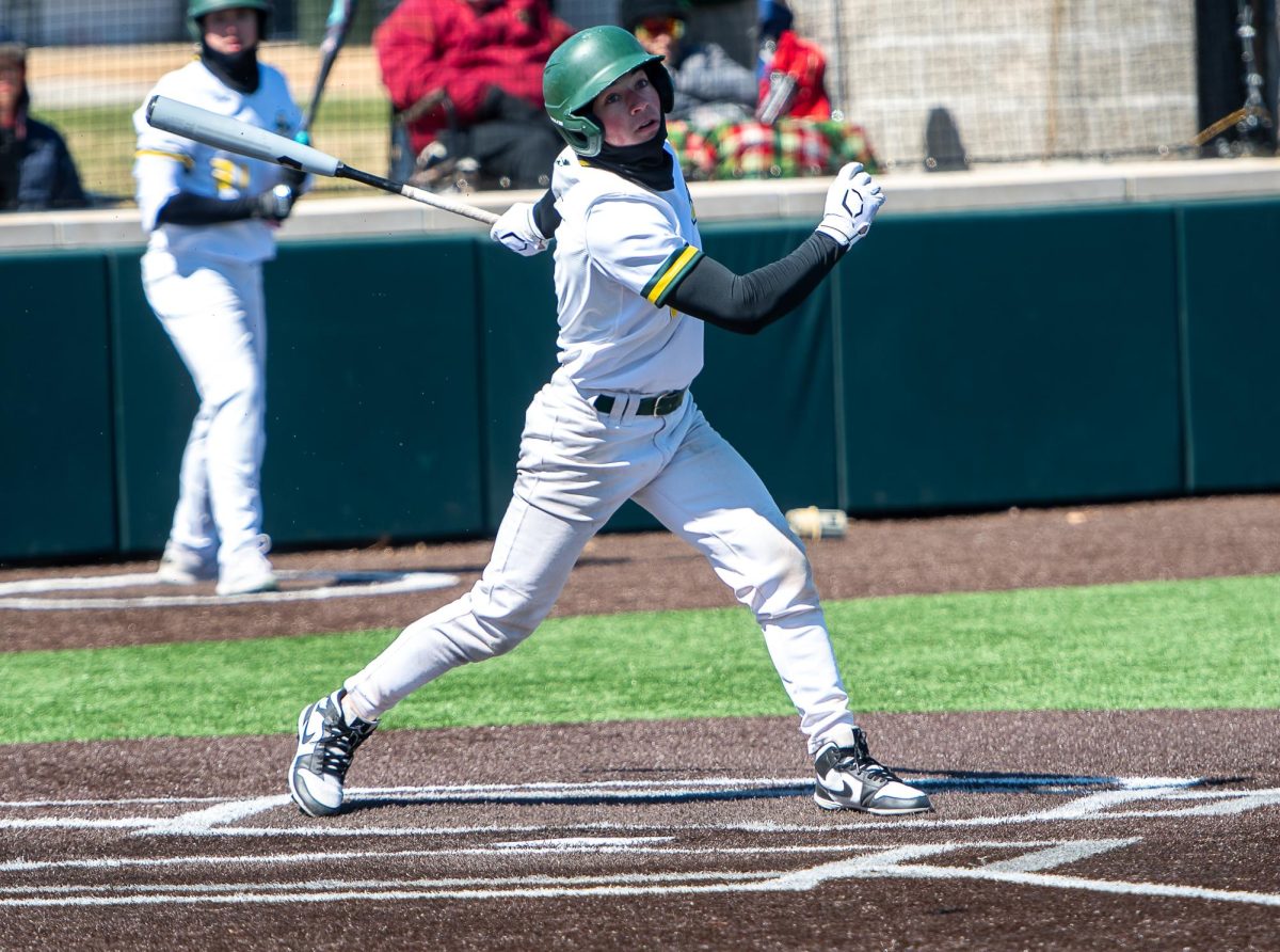 A Lindbergh batter follows his swing through.