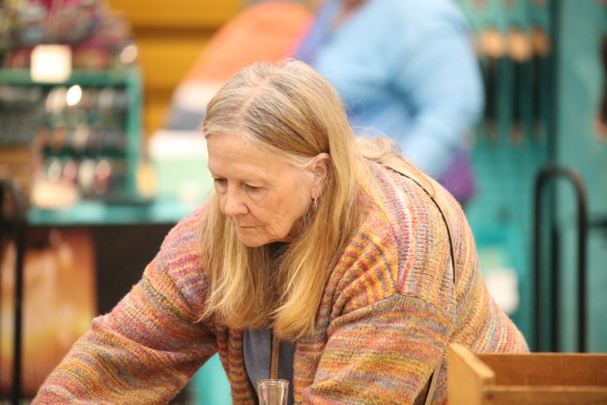 A vendor starts to clear out her station as the Crestwood-Sunset Hills Rotary Club's spring 2025 “Arts and Crafts Fair” comes to a close.