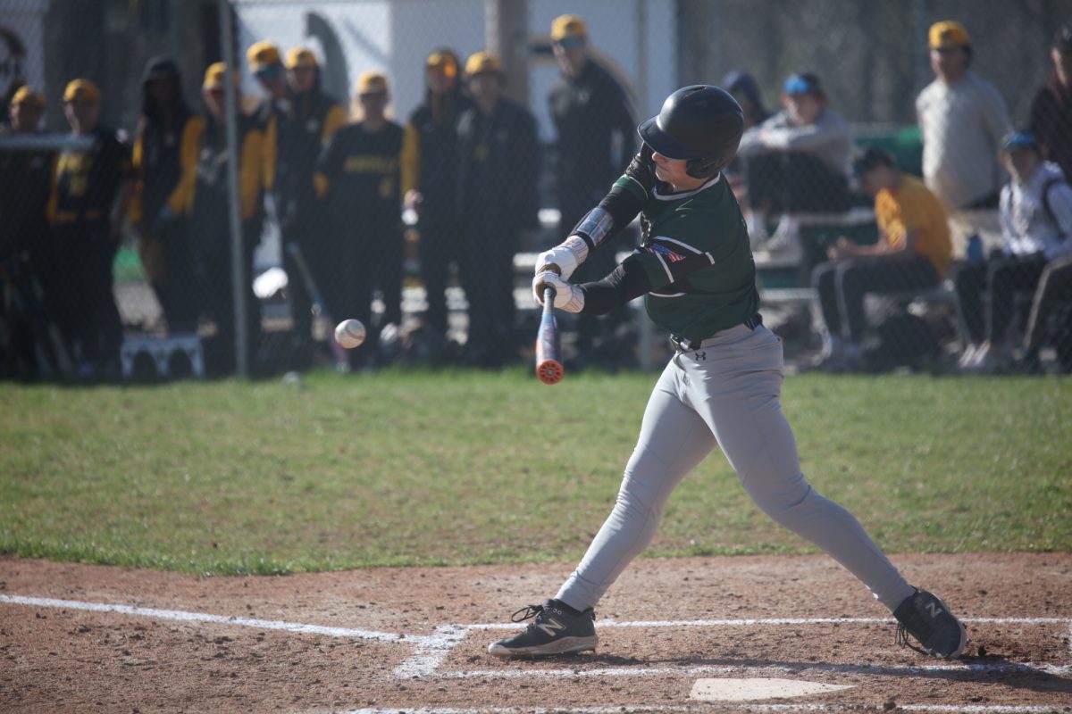 A Mehlville batter swings at a pitch.