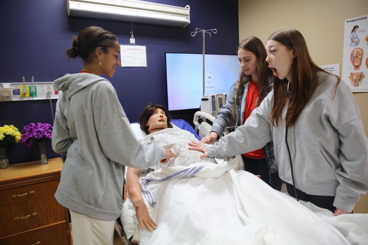South Tech students gasp at the realism of the SIMLab patient mannequins at Chamberlain
University. The mannequins have the ability to breathe, blink and have stretchy skin. The mannequin
pictured above simulated a postpartum woman.