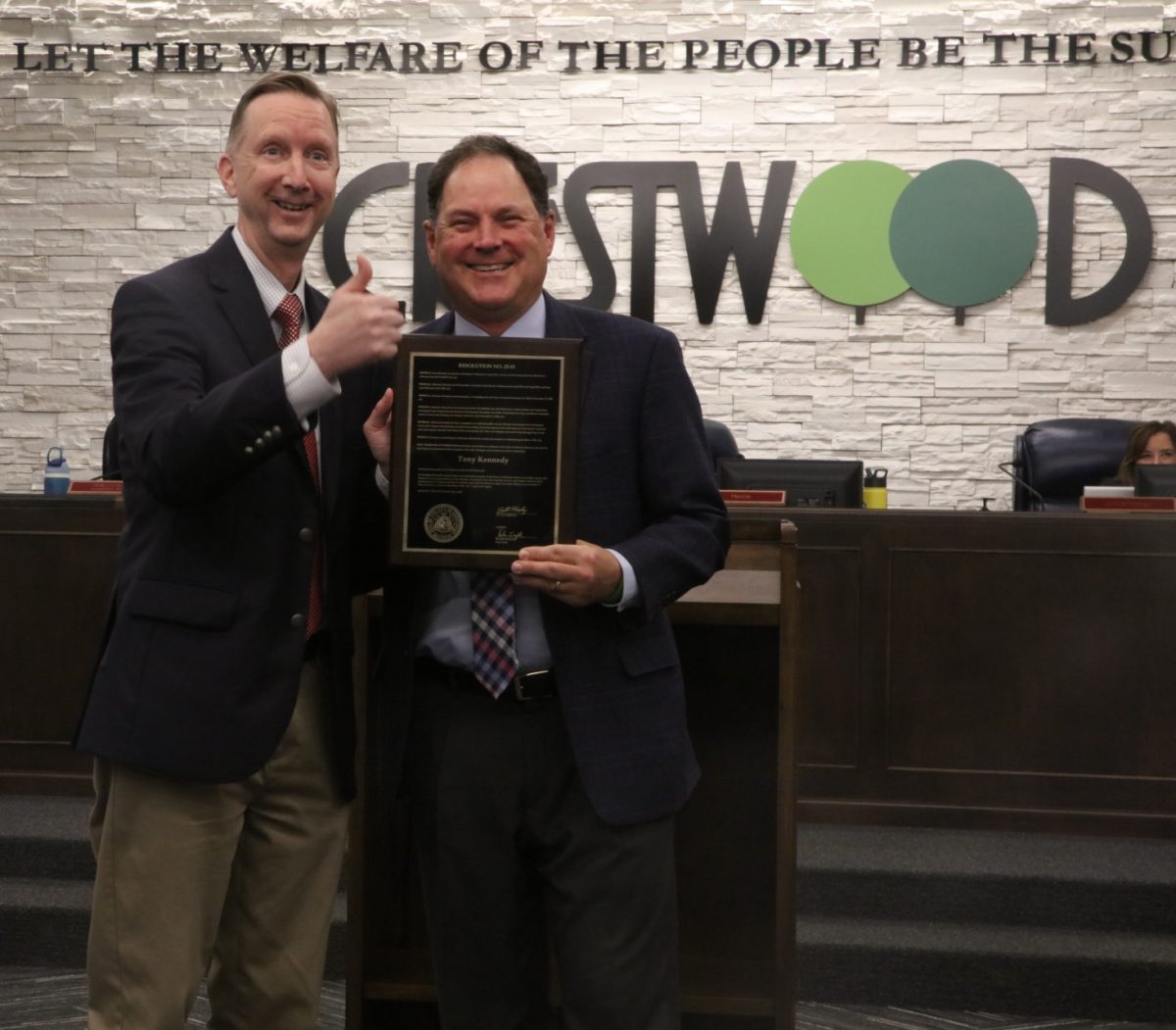 Crestwood Mayor Scott Shipley and former Ward 4 Alderman Tony Kennedy smile with the resolution presented to Kennedy in honor of his time served on the board.