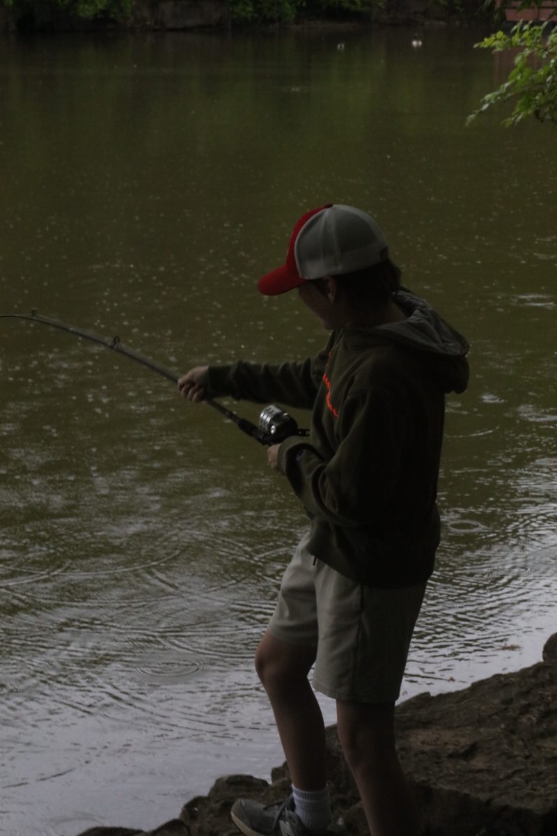 An attendee battles a catfish.