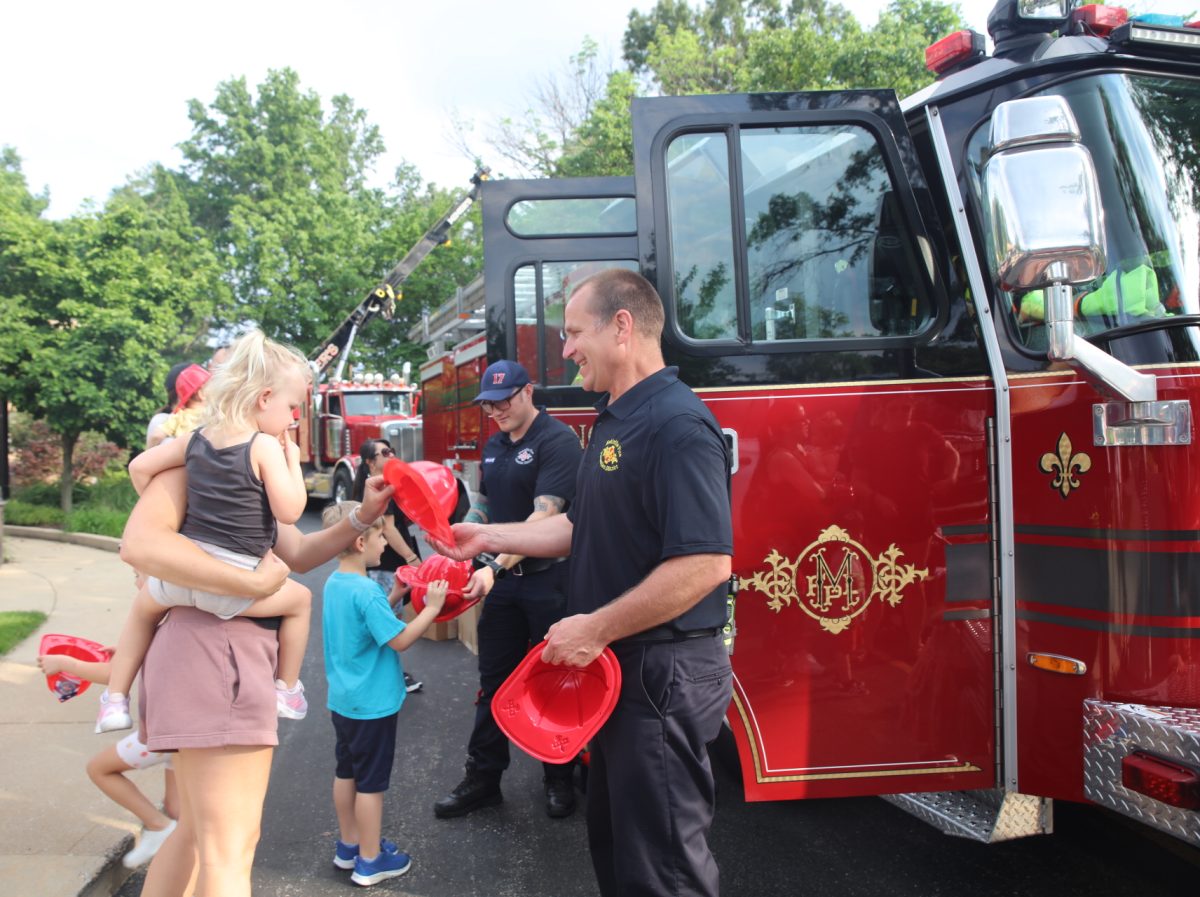 Firefighters gave attendees their own plastic fire hats.