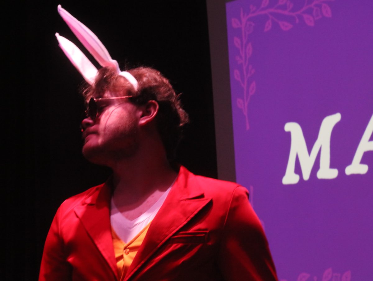 A Lindbergh Thespian wears a white rabbit costume from Alice in Wonderland.