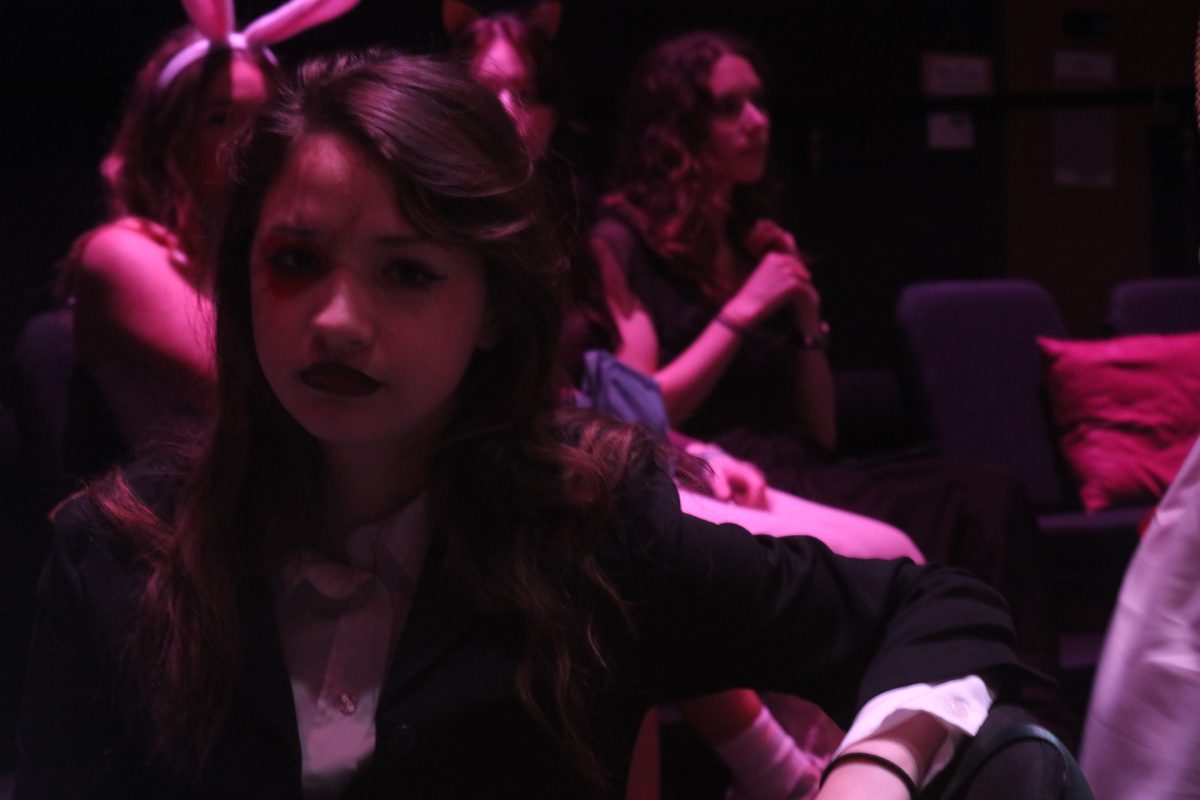 A Lindbergh thespian sits at a table ready for the award ceremony.