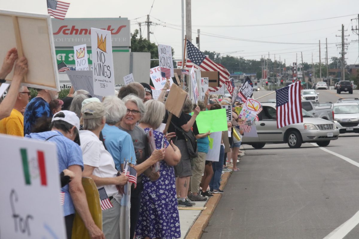 Protestors gather at the intersection of S. Lindbergh Boulevard and Baptist Church Road.