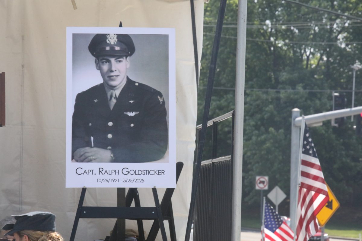 A picture of Capt. Ralph Goldsticker was prominent on the stage at the memorial dedication. Goldsticker died May 25, just two weeks before the unveiling ceremony.