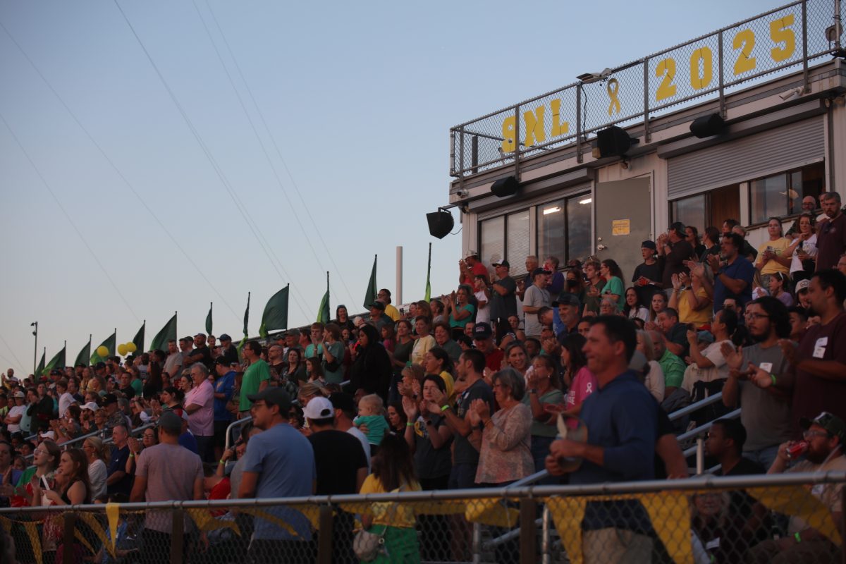 The atmosphere was lively as fans stood to applaud those on the field.
