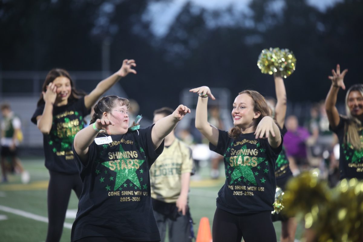 The Shining Stars dance team performed a Halloween-themed dance during the flag football game's halftime.