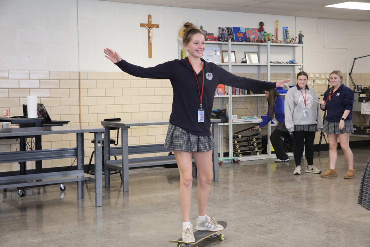 Cameron Thierauf holds out her arms, shocked to be skating without assistance.