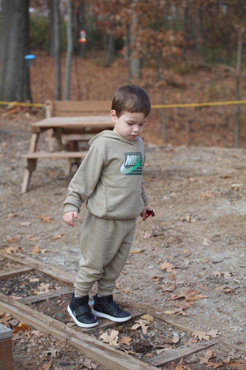 A John Cary Early Childhood Center student practices balancing, honing gross motor skills.